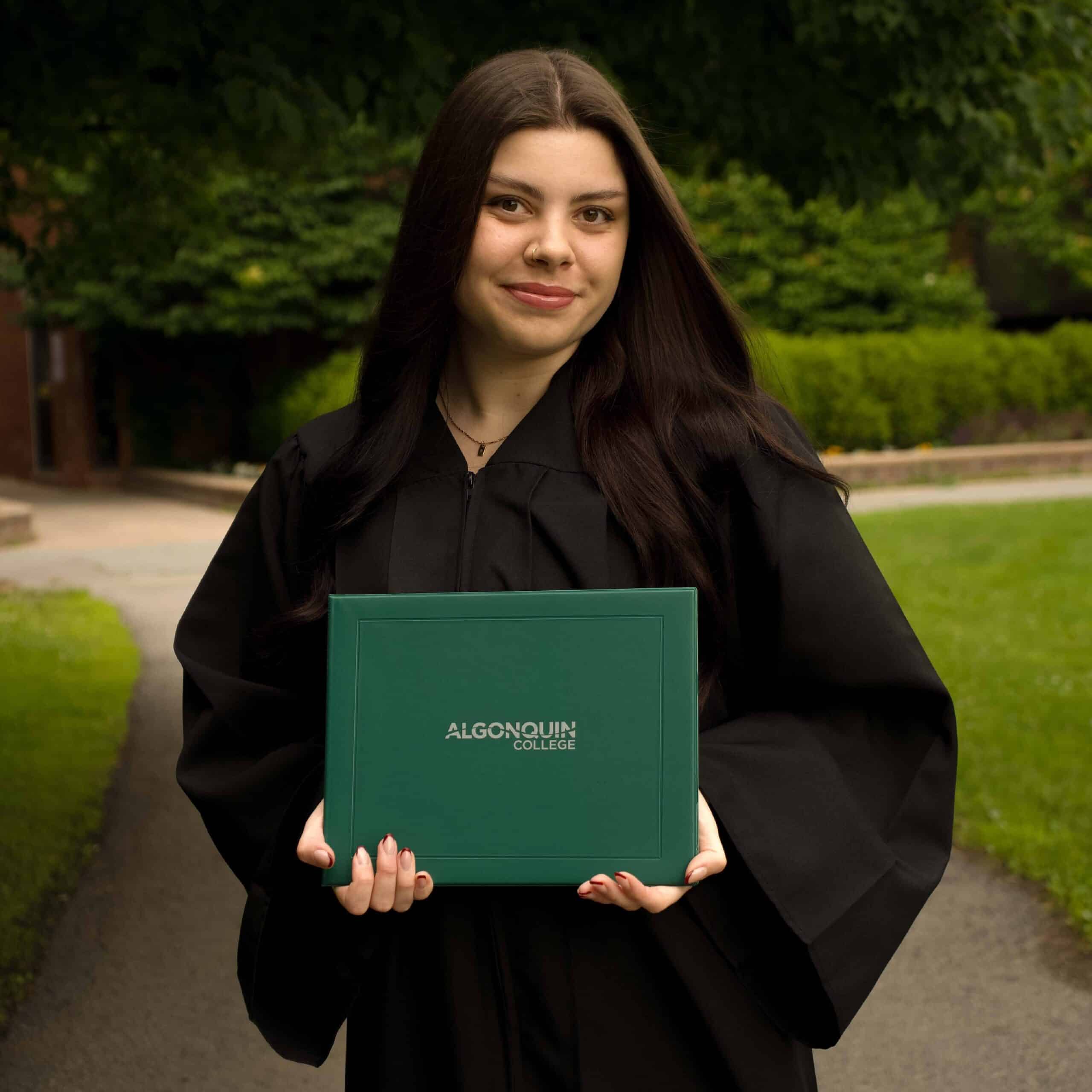 Bree Holding Diploma