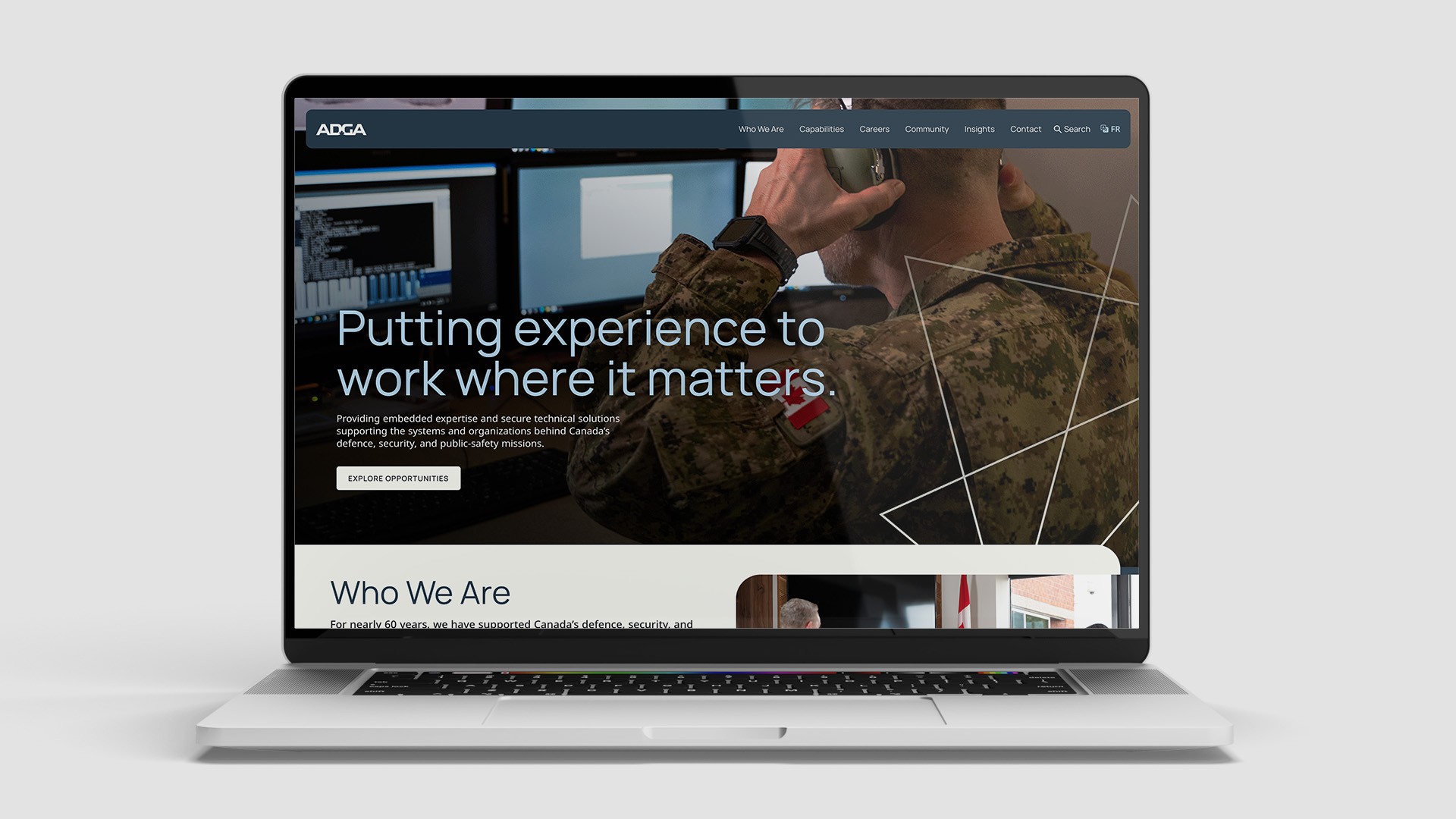 A mockup of ADGA's website on a laptop.